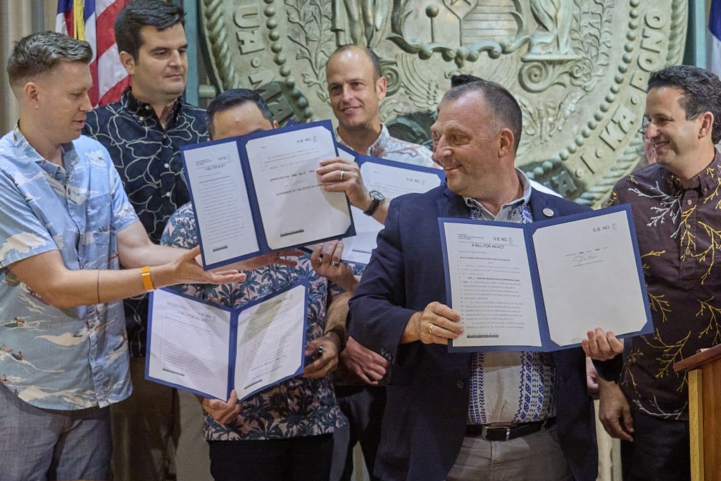 Hawaii Governor Josh Green M.D. signed several Bills into law pertaining to the housing shortage in Hawaii. Several members of his cabinet along with Senator Brian Schatz shared in the moment, Photographed May 28, 2024 (David Croxford/Civil Beat/2024)