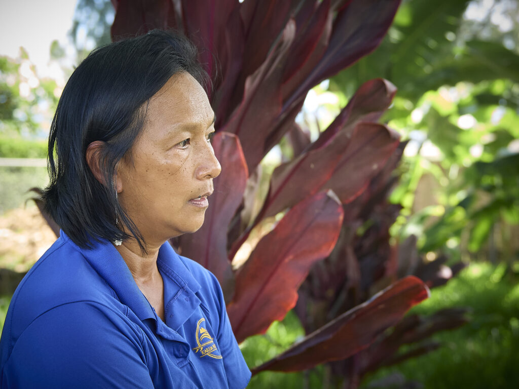 Espie Chapman is one of the teachers at Kailua Intermediate School who has taken on the task of teaching students about how to grow everything from Taro to Bananas and gives them practical knowledge in the garden in Kailua. (David Croxford/Civil Beat/2024)