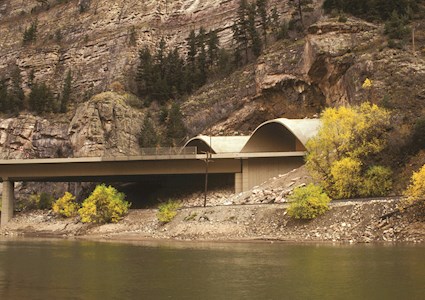 twin tunnels spanning body of water