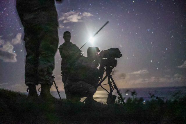 Schofield Barracks, HI — Fire Support team (FiST) from 3-7 Field Artillery, 25th Infantry Division Artillery and attached to Charlie Company, 2nd Battalion 35th Infantry Regiment, 3IBCT conducted a TMP convoy with Overhead support from AH-64’s to establish an observation post at Makua Valley in Waianae, Hawaii on 15 April, 2021. They conducted Artillery Air Assault call for fire, and other key training tasks to hone their craft. (U.S. Army photo by Spc. Jessica Scott)