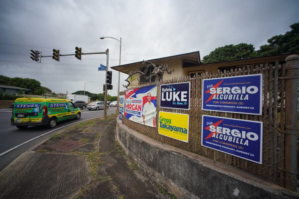 Campaign 2022 signs along Moanalua Road near the intersection of Hoomalu Street in Pearl City.