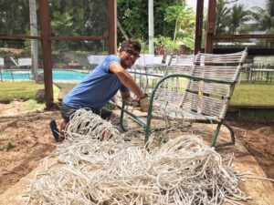 John Reynoʻs twin brother Jeffrey wraps Walter Lamb chairs with rope. Walter Lamb originally wrapped his chairs with ordinary cotton clothesline, but Los Angeles customers claimed the rope turned black in LAʻs smog. He later switched to polyethylene rope. Reyno says he wraps his restored Lamb chairs in cotton, polyester or vinyl but says most of his customers like cotton or polyester. (Courtesy: Kristen Reyno)