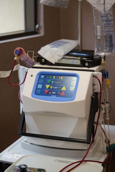 Kalani Pagan receives dialysis during a 5-week training on how to use the machines with registered nurse Linda Tsui RN. The process takes a little under 3 hours.