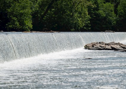 Photo of a low head dam by Mark Stenglein on Unsplash