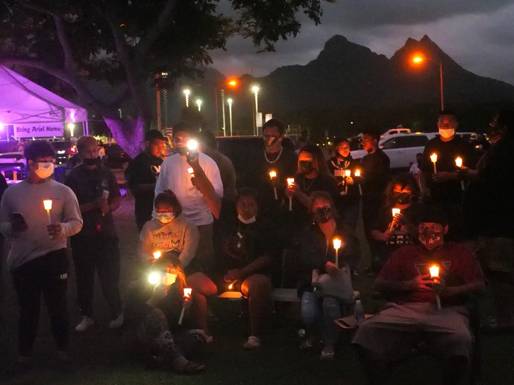 At the conclusion of day long search efforts for the missing 6 year old girl Ariel Sellers (also known as Isabella Kalua) in Waimanalo Sunday, September 19, 2021, community members came together for a candle light vigil to support one another at the Waimanalo District Park.  (Ronen Zilberman photo Civil Beat)