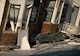 An automobile lies crushed under the third story of this apartment building in the Marina District in San Francisco after the Loma Prieta earthquake on Oct. 17, 1989. The ground levels are no longer visible because of structural failure and sinking due to liquefaction. (Image courtesy of John K. Nakata/USGS)